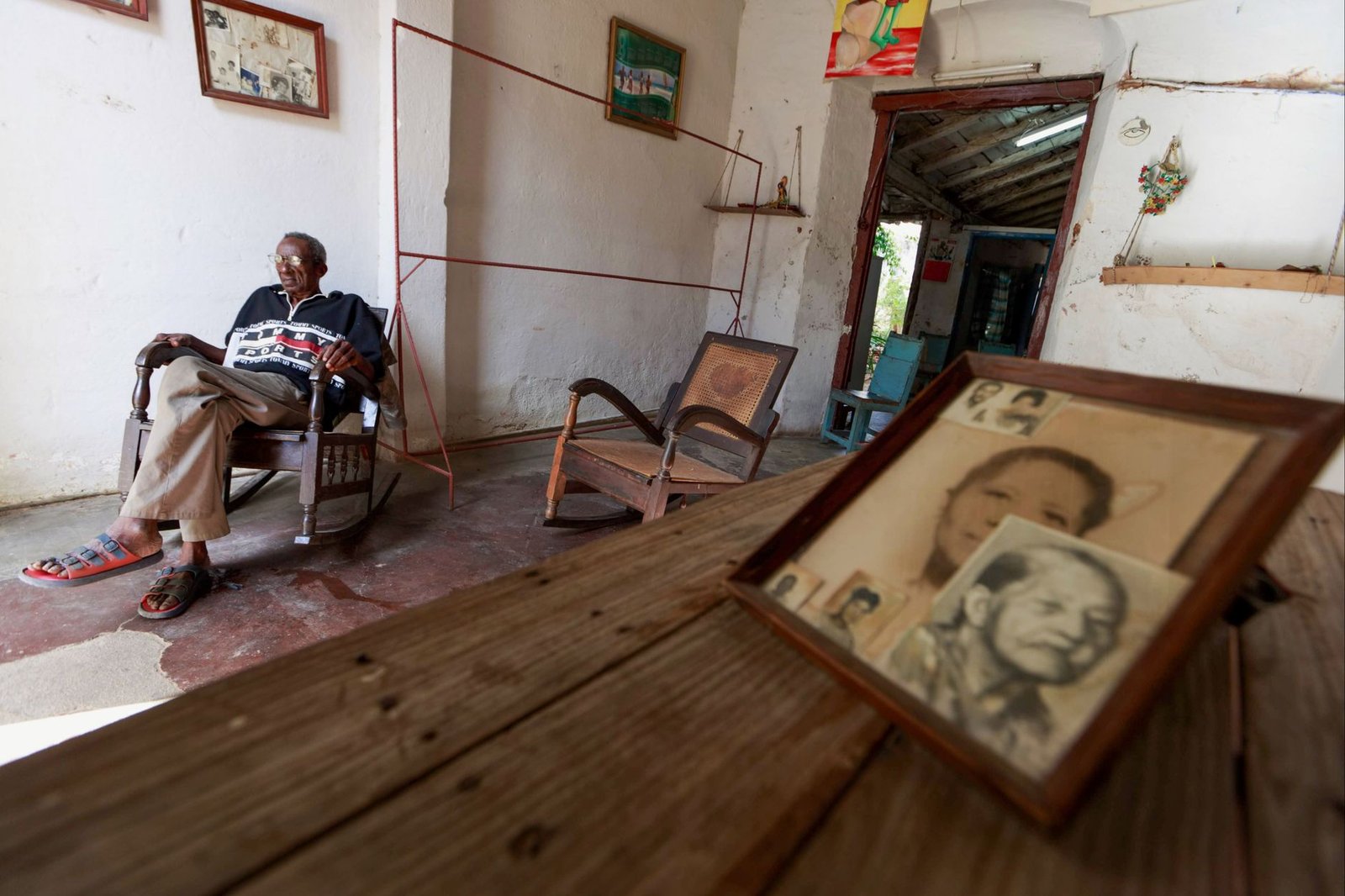 Framed photo of a veteran displayed at home, the kind of tribute families pair with a Presidential Memorial Certificate