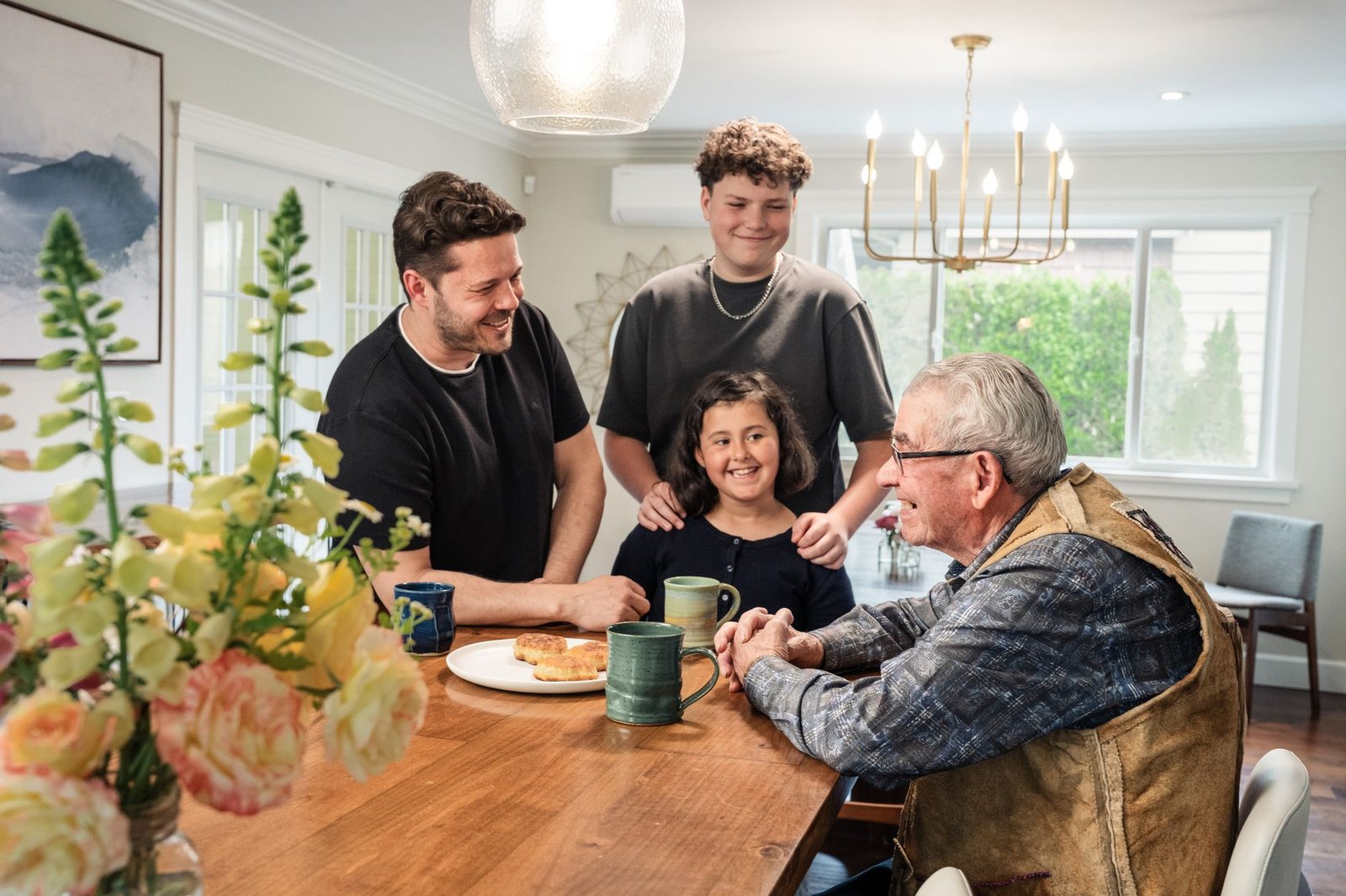 Veteran and adult son talking through gunner's mate asbestos exposure history at home