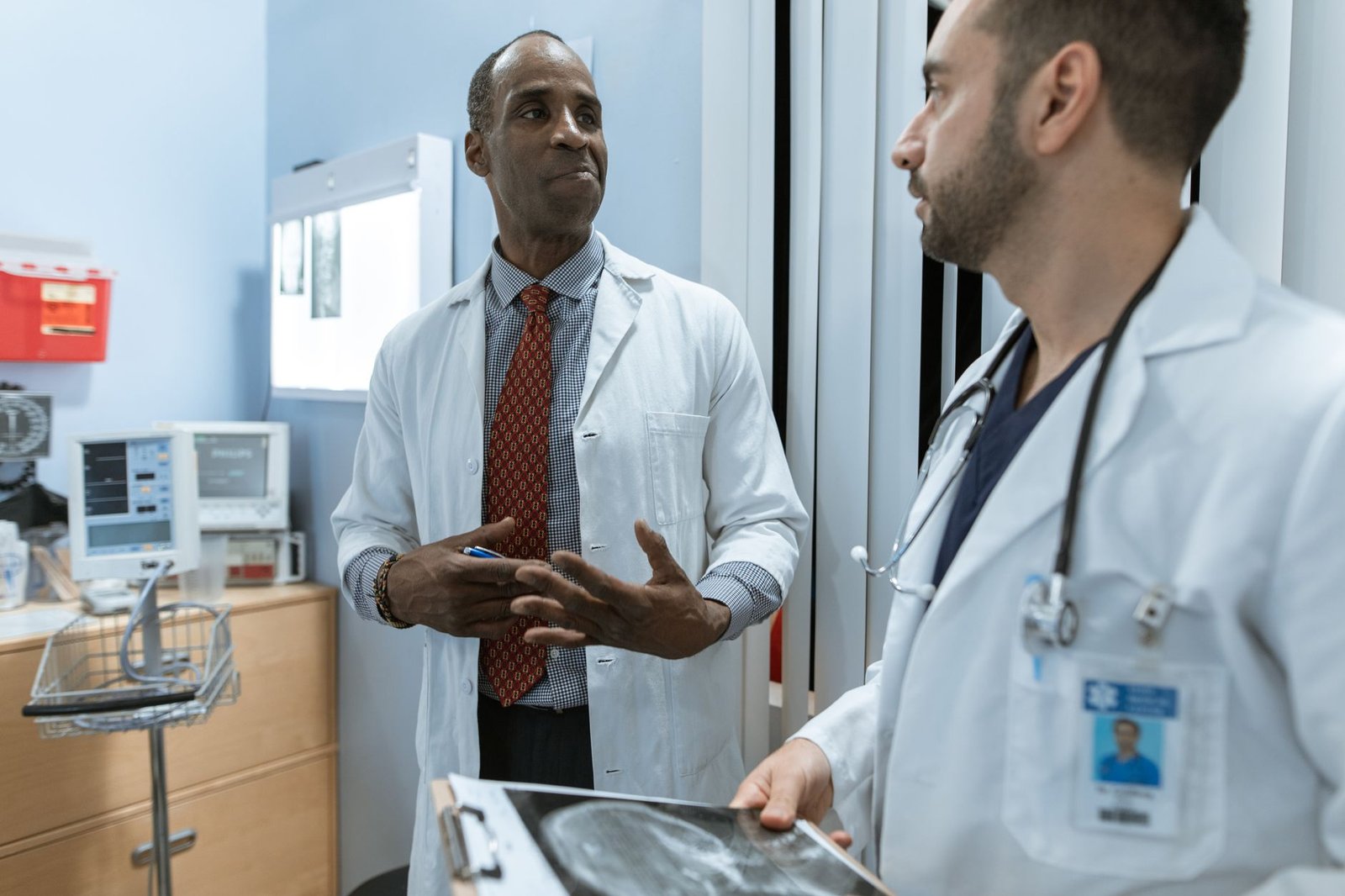 Veteran discussing the VA precision oncology program with an oncologist during a clinic visit