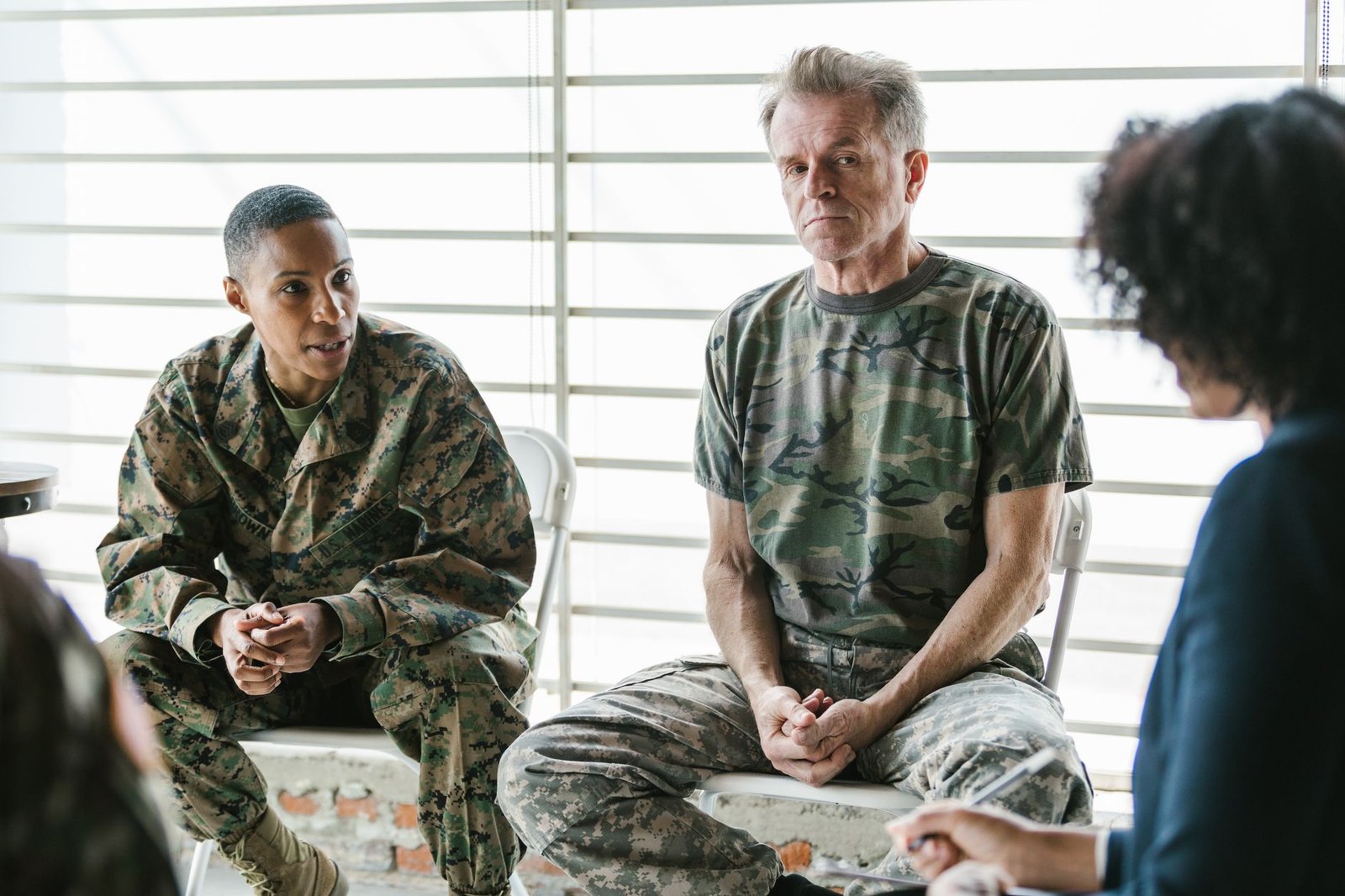Veteran and family member in a supportive consultation, an example of VA social work services for veterans in action