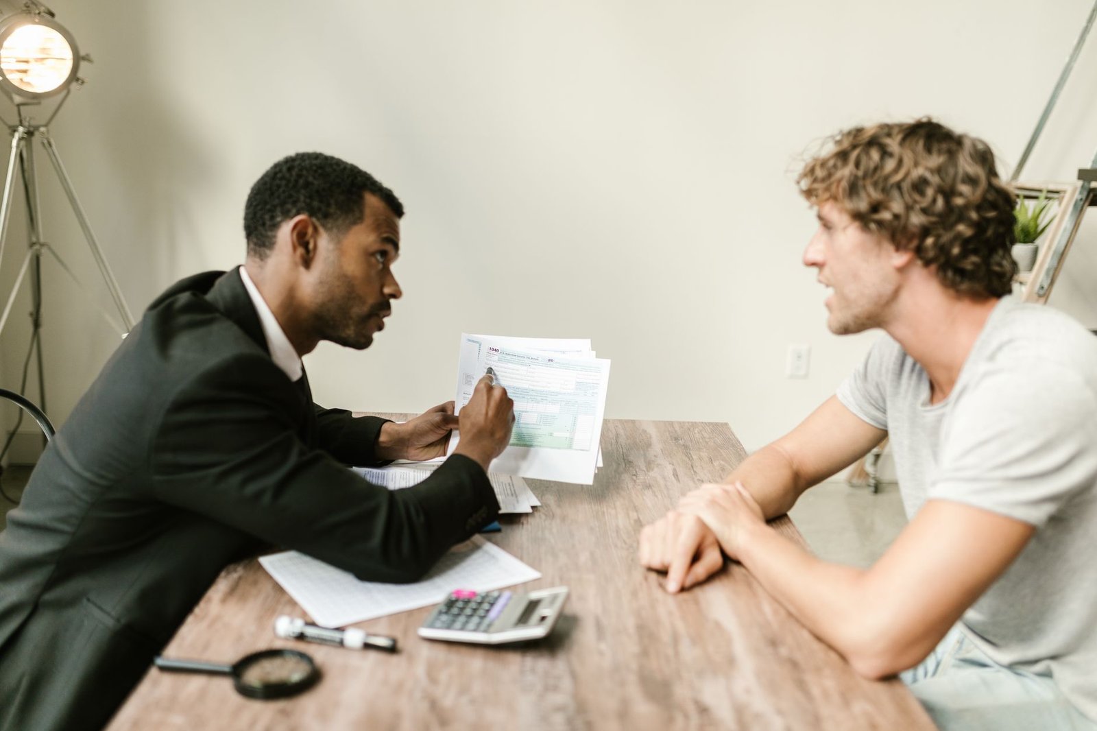 Veteran discussing a possible gunner's mate asbestos exposure claim with a benefits advisor