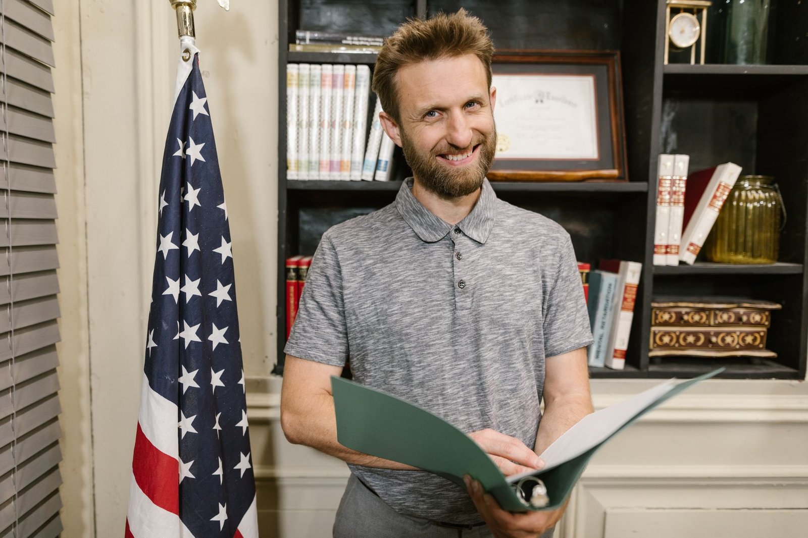 Veteran reviewing one of the VA claim development letters at the kitchen table