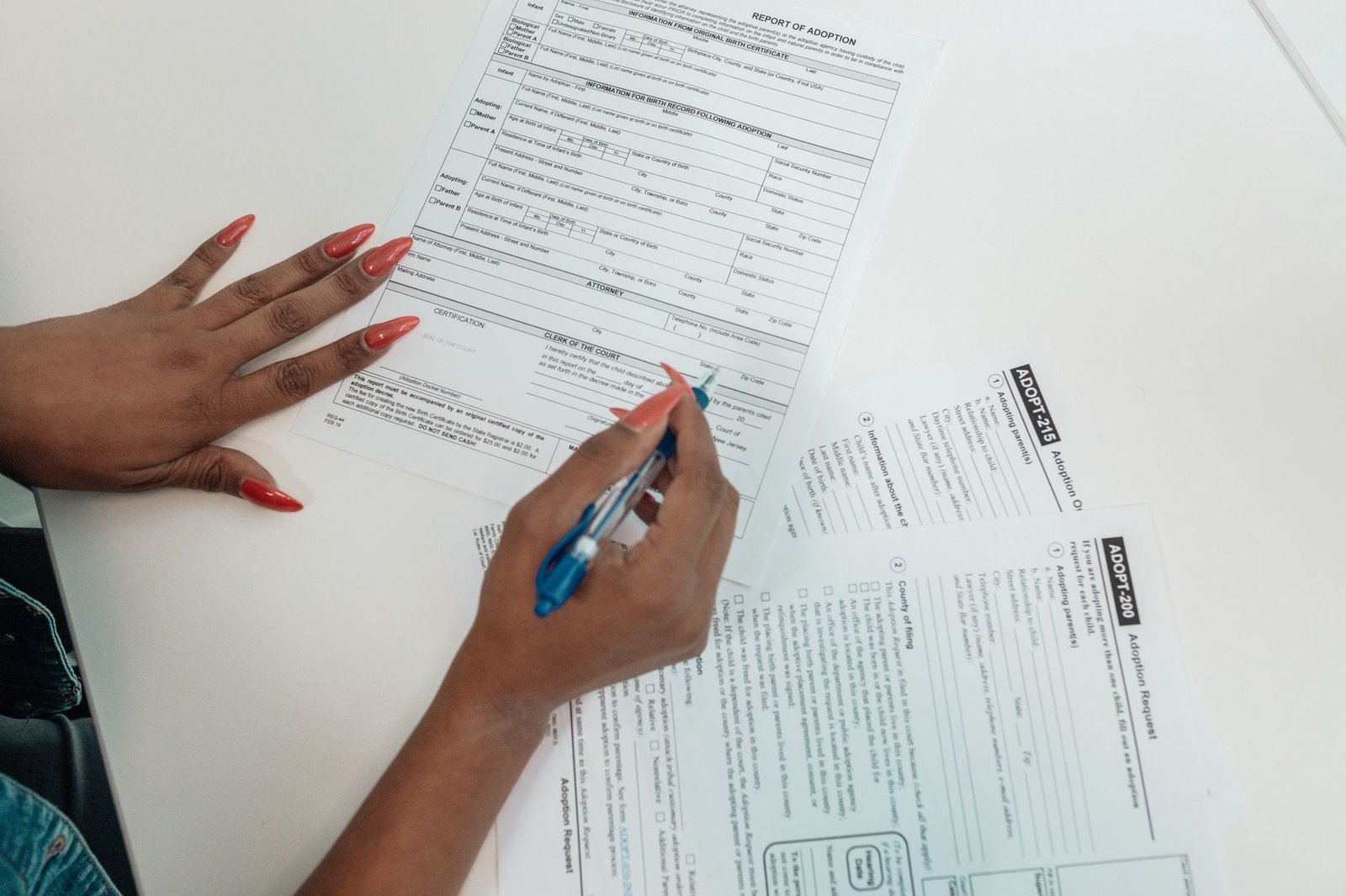 Hands completing a written request, part of how to request your VA claims file