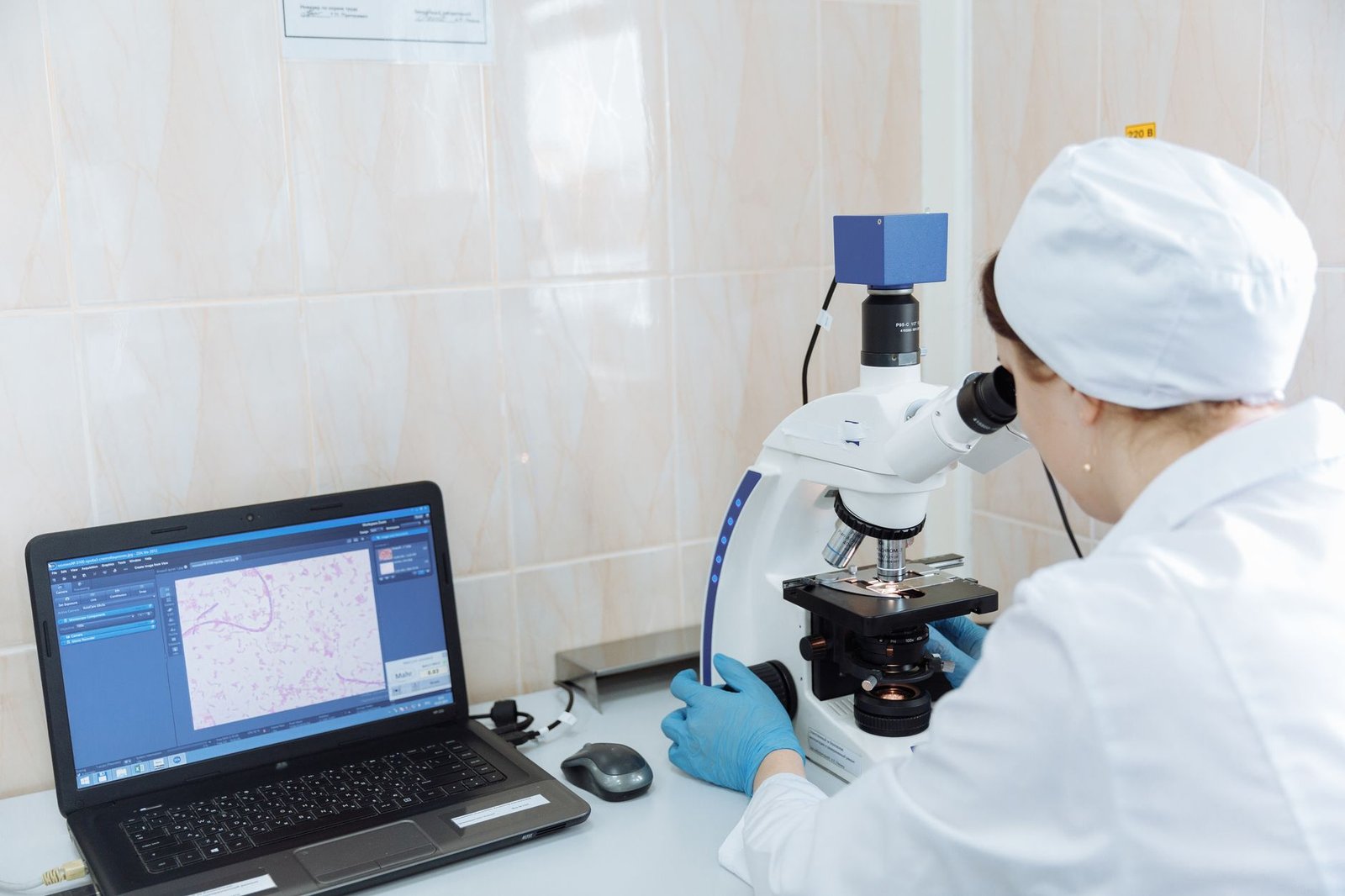 Laboratory review of a tumor sample, part of the testing behind the VA precision oncology program